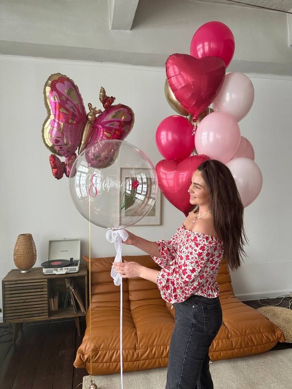 Tauriņš ar rozā baloniem