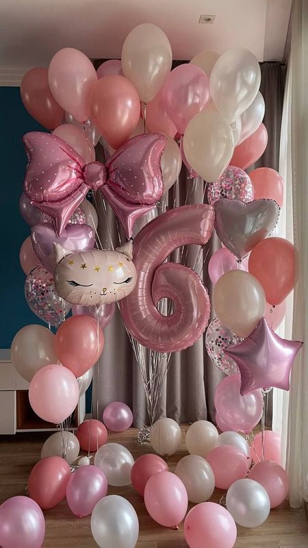 Розовая кошечка с бантом